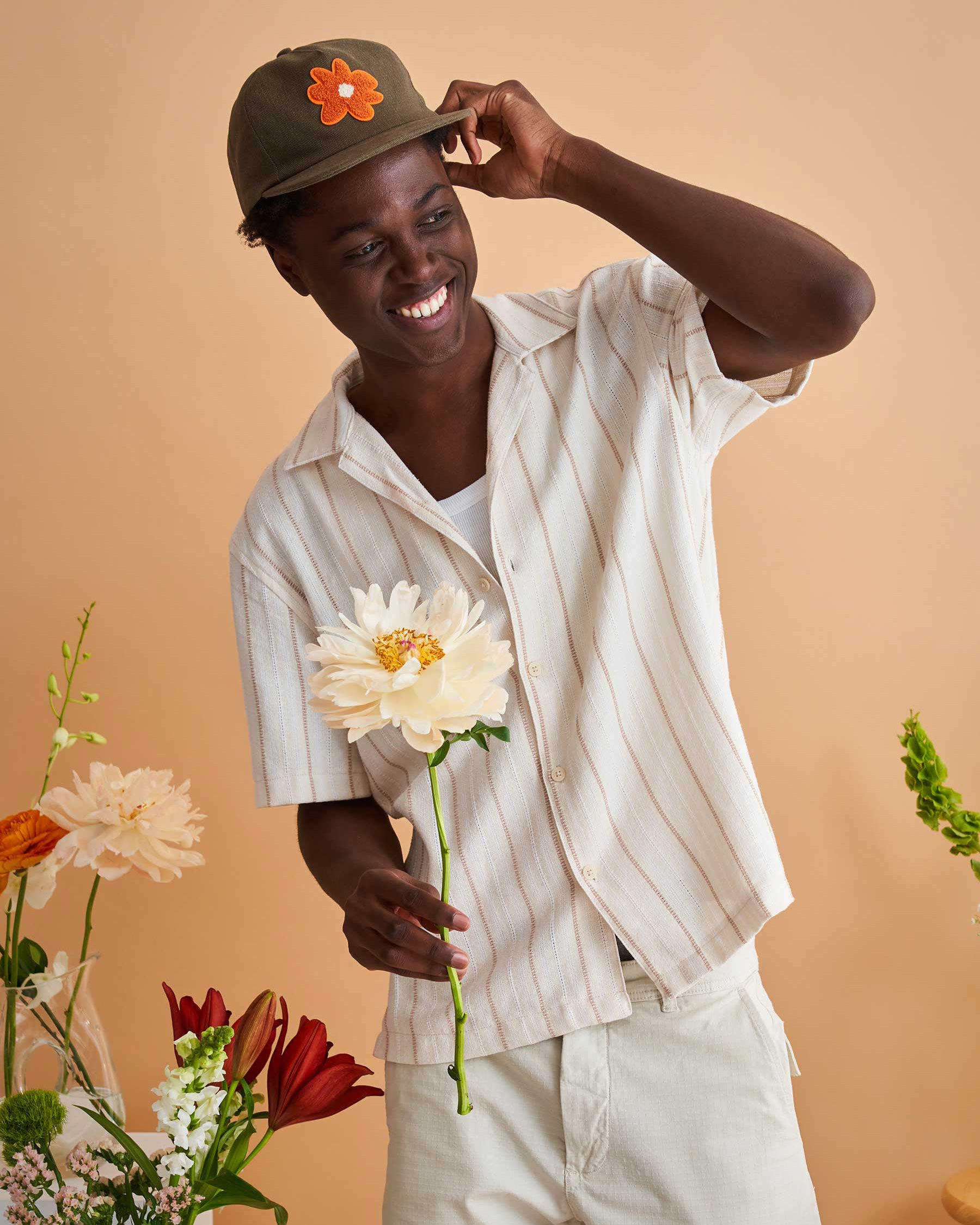 Flowers on hats on sale